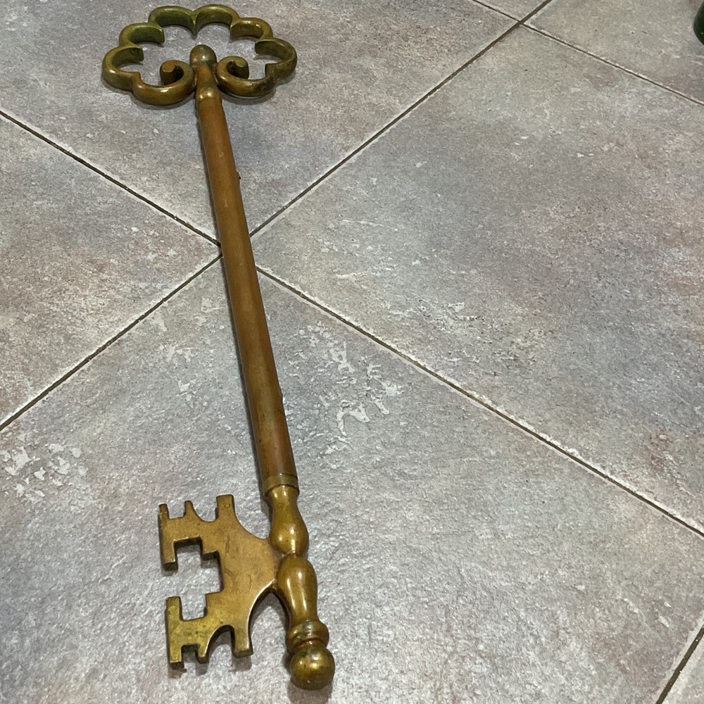 Vintage Brass Decorative Key 18.5 inches long.